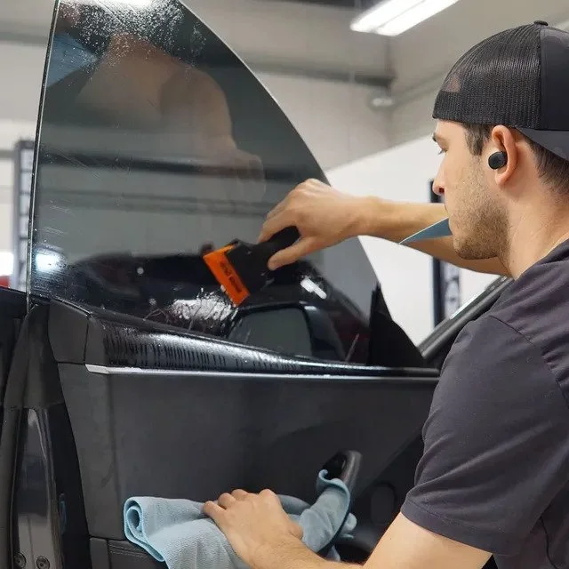 Completed window tinting with clean lines and professional finish